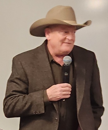 Craig Johnson speaking at the Osher Institute